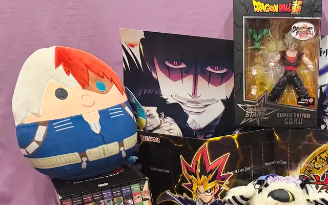 Anime figures and plush, including a Super Saiyan Goku figure