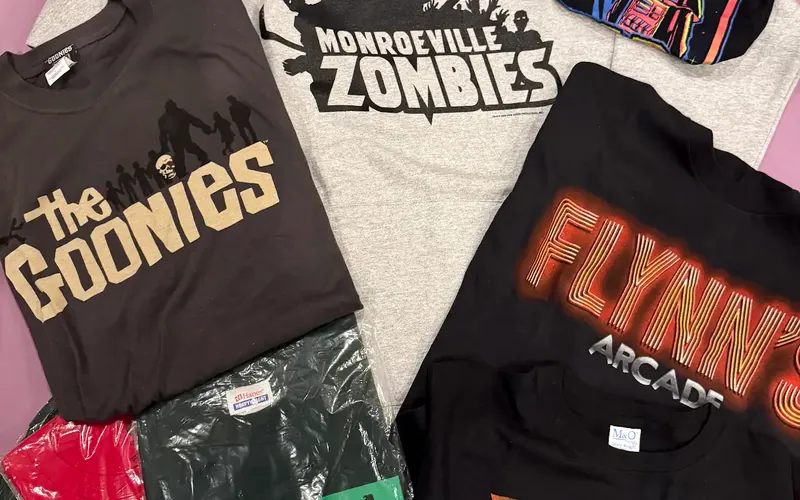 Retro t-shirts and hoodies, including The Goonies, Flynn's Arcade and Monroeville Zombies
