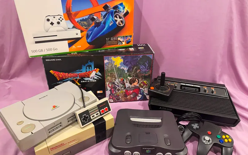 Retro and modern consoles: PlayStation, NES, Nintendo 64, Atari 2600, a boxed Wii and a boxed Xbox One S